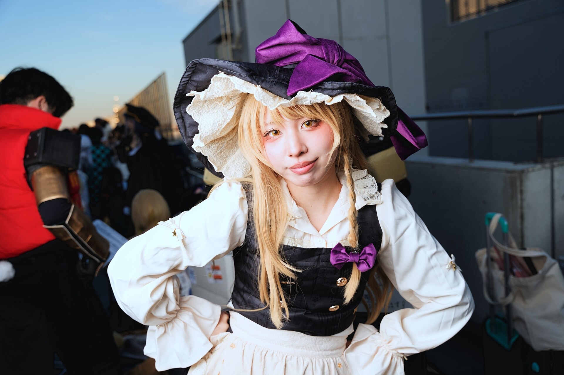 A cosplayer portraying Marisa Kirisame from Touhou Project at Winter Comiket C107, 30 December 2025.