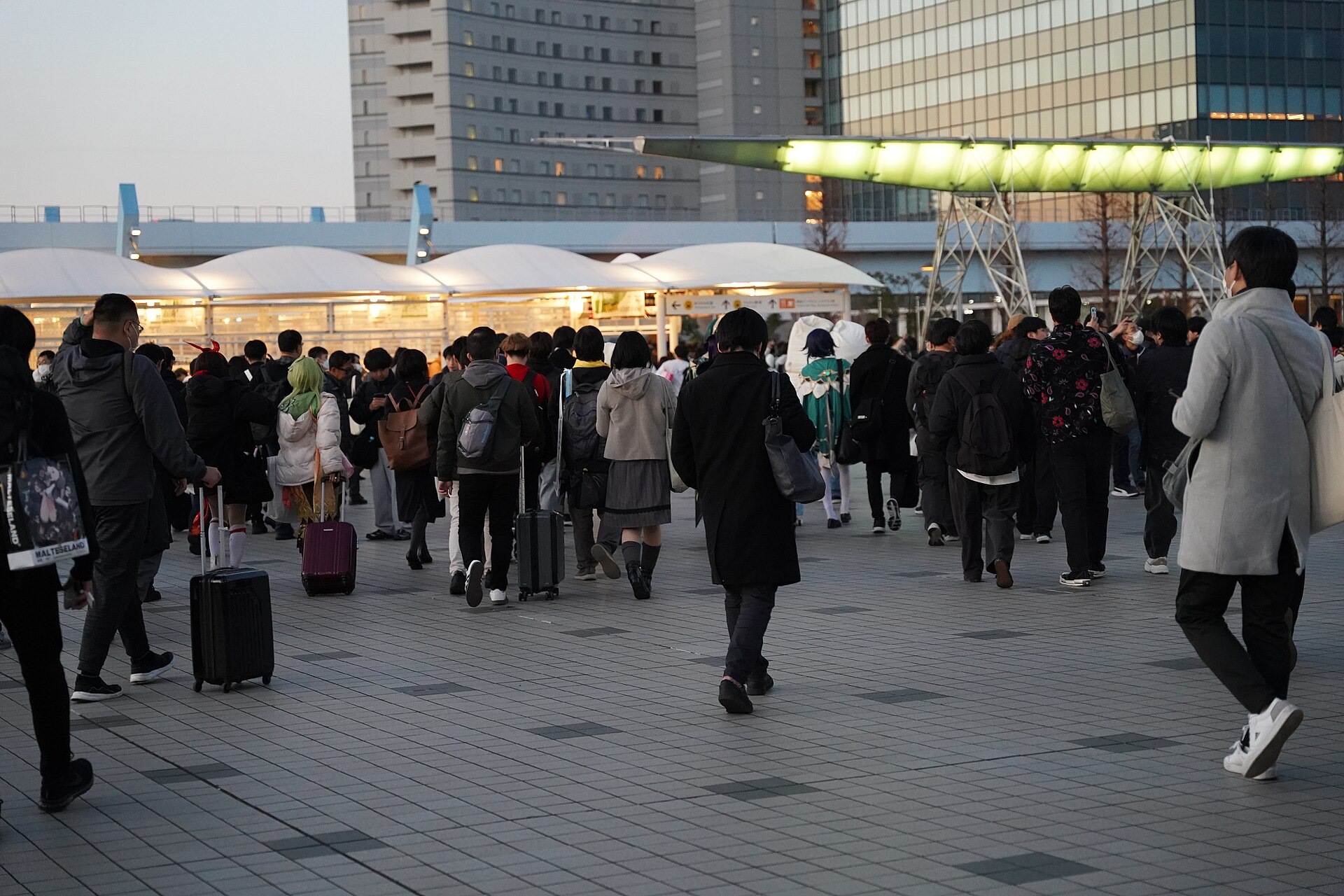 Visitors leave after the first day of Winter Comiket C107, 30 December 2025.