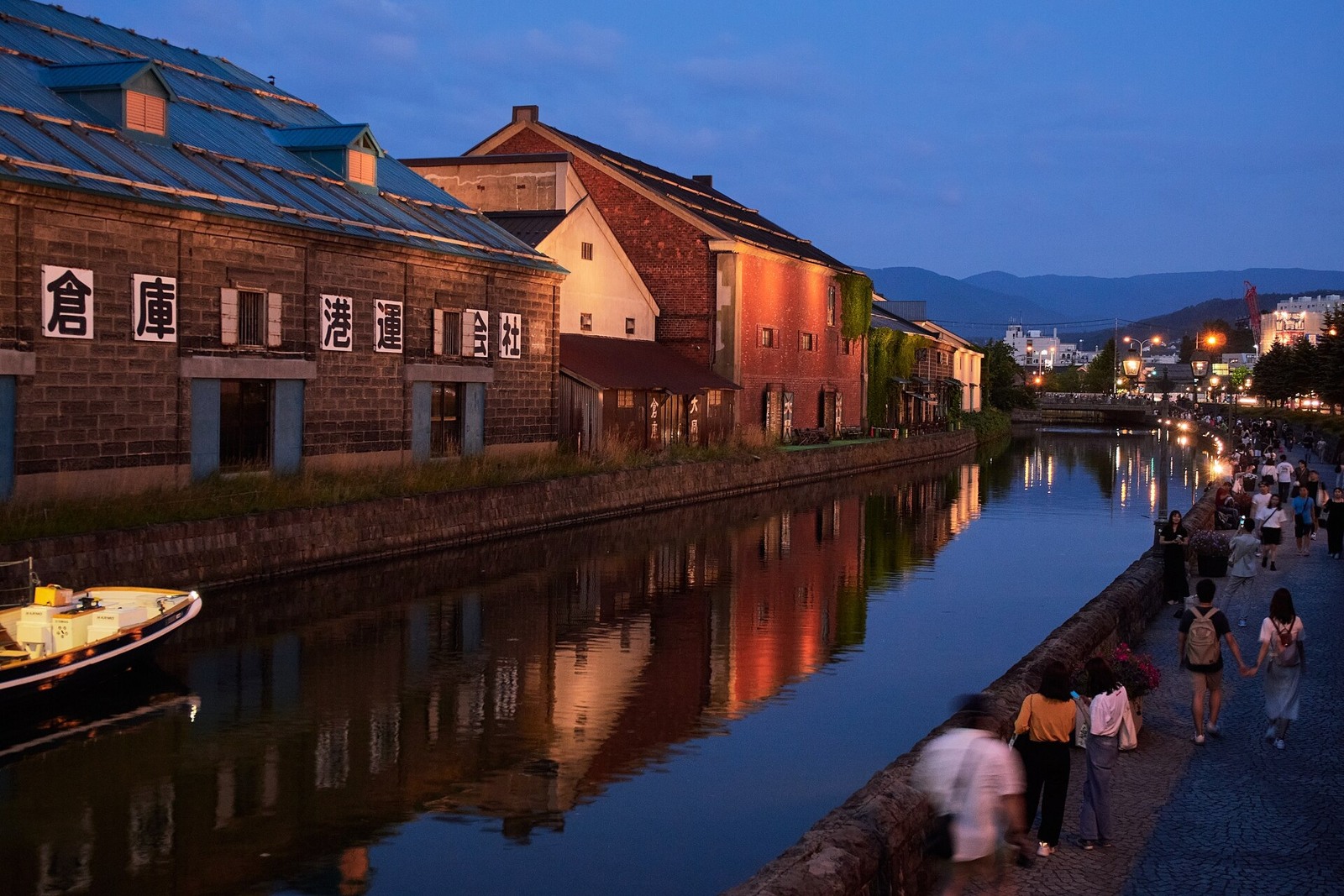 Lights reflected in Otaru Canal at dusk.