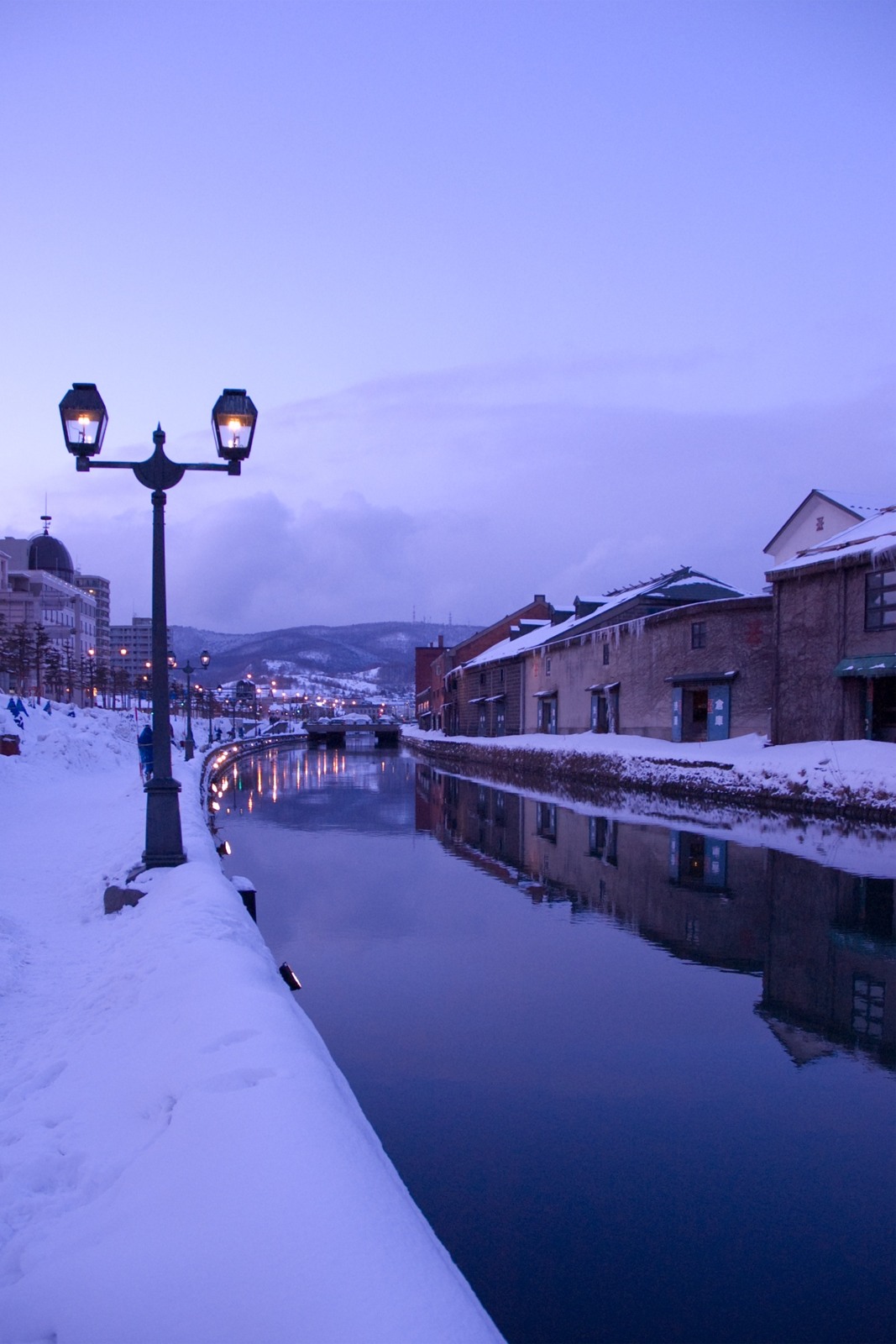 Snow along Otaru Canal at dusk in February.