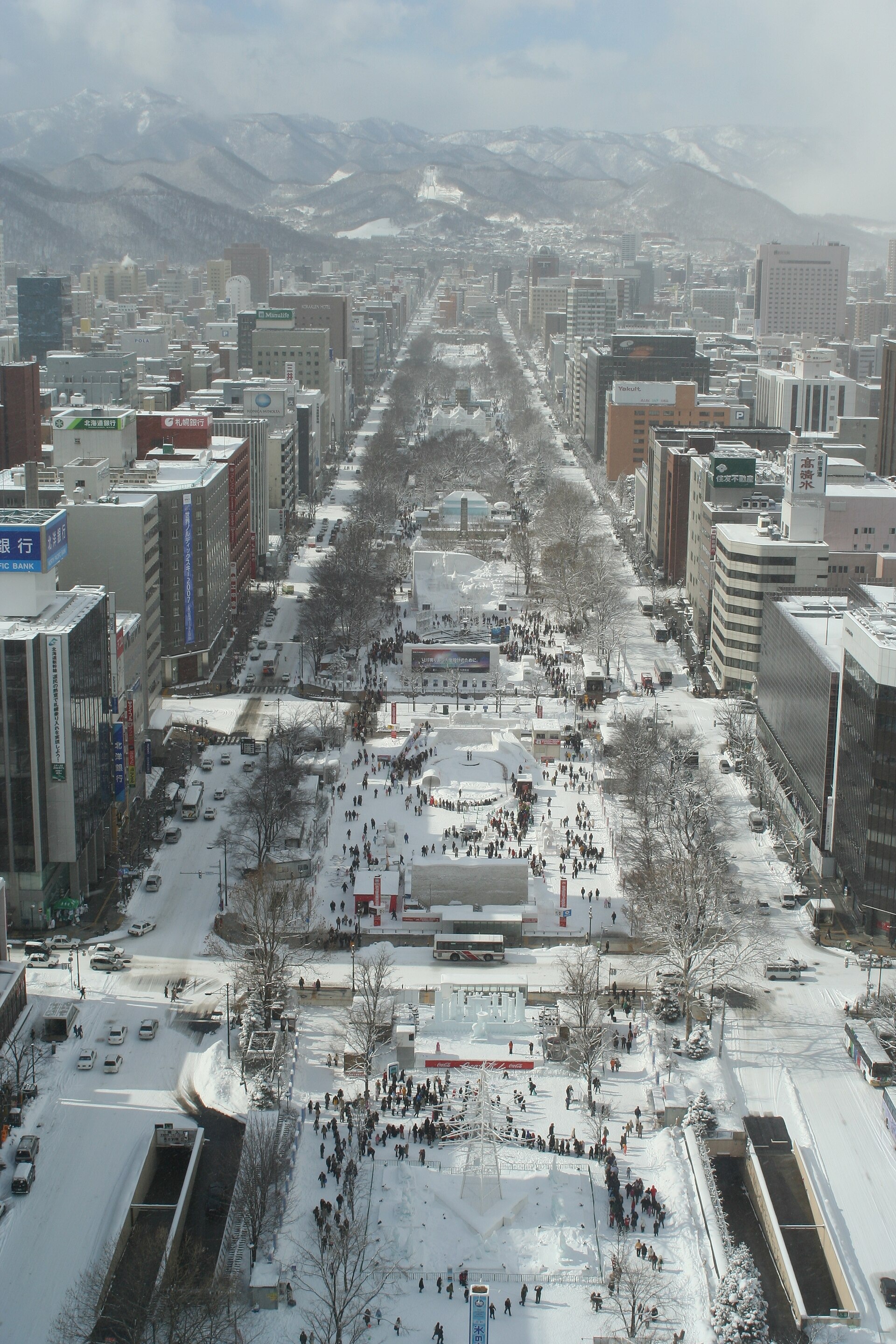 A daytime overview of the 2007 Sapporo Snow Festival in Odori Park.
