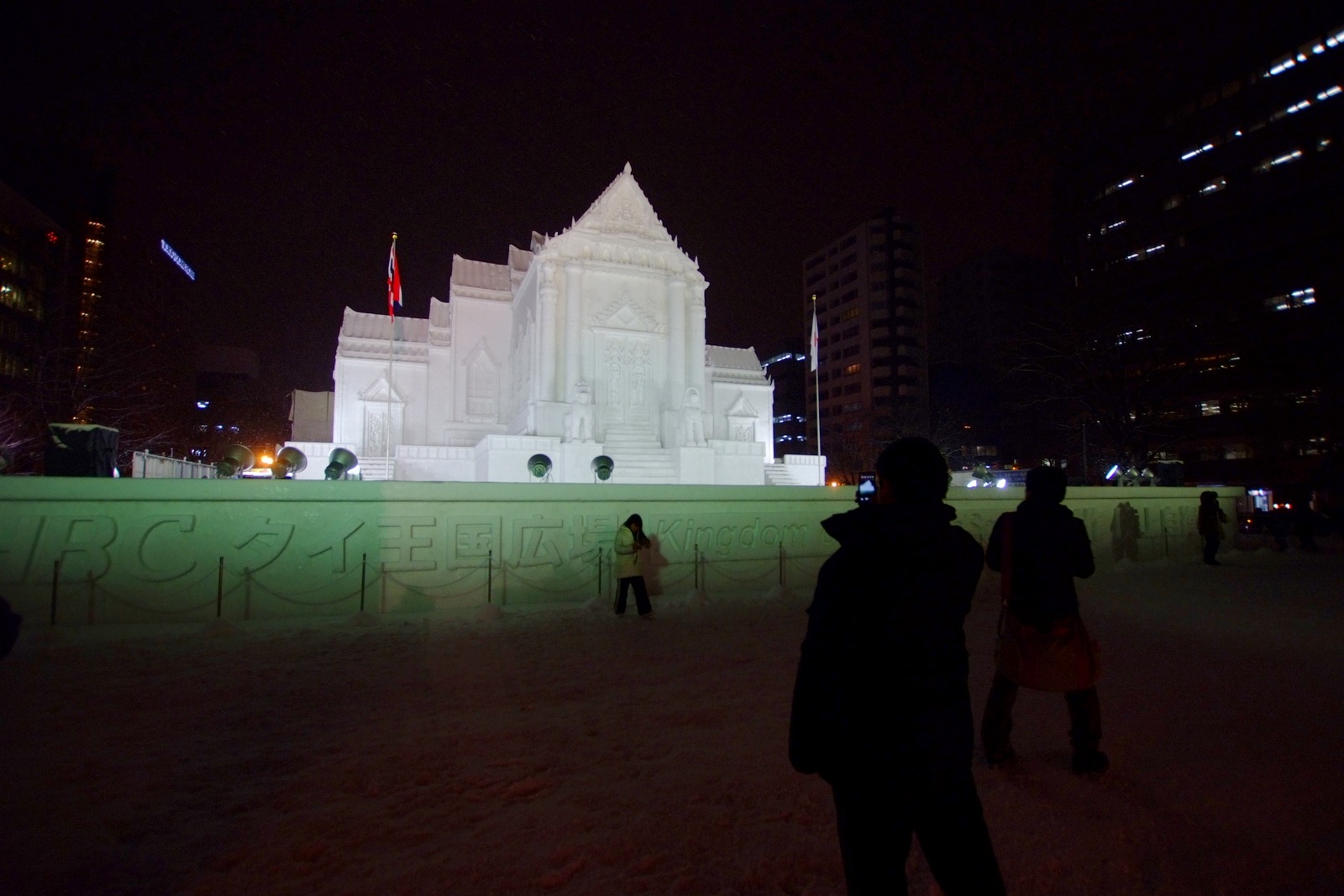 A monumental snow sculpture of Wat Benchamabophit, lit up at the 64th Sapporo Snow Festival in 2013.