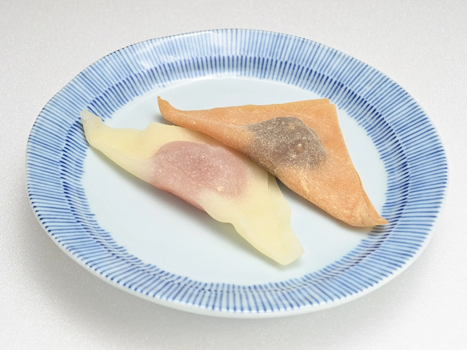 Soft nama-yatsuhashi sweets on a small plate.