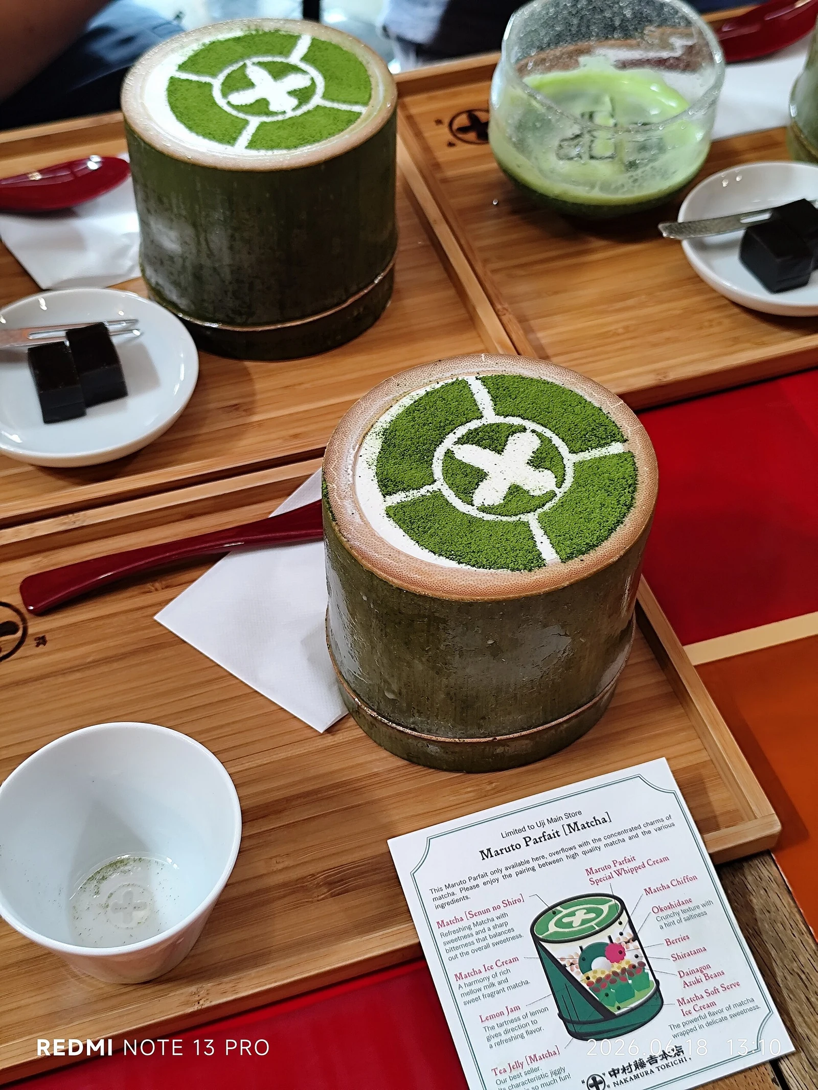 Matcha sweets served in bamboo-shaped containers in Uji.