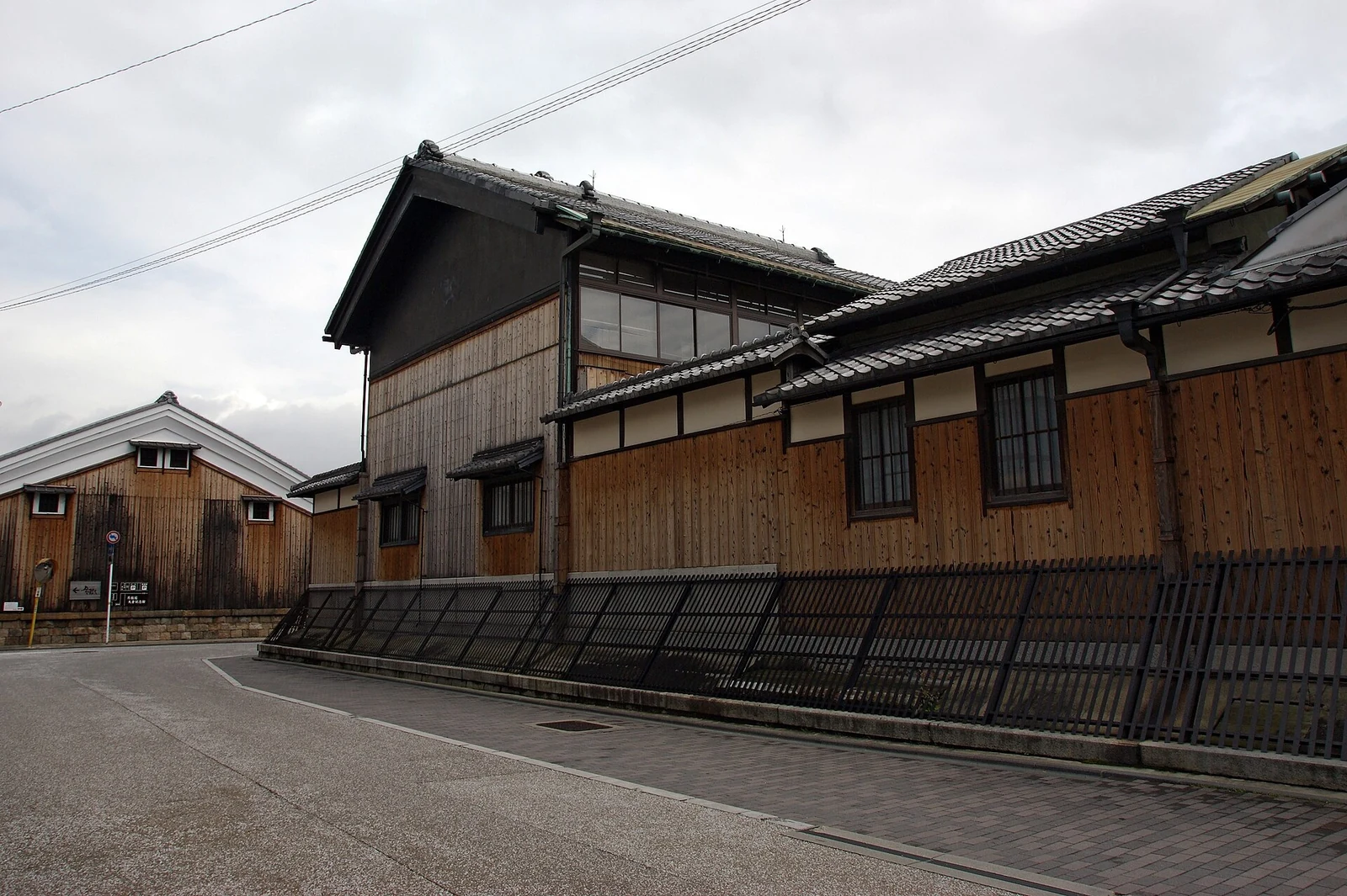 A long warehouse frontage along the street.