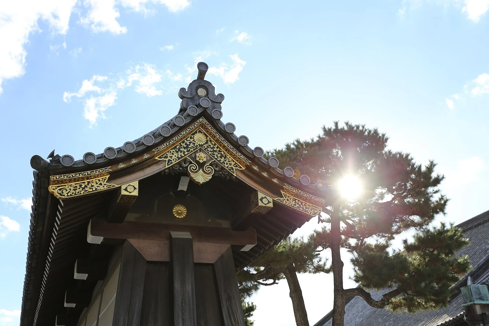 Sunlight catches the carved details of Kara-mon Gate.