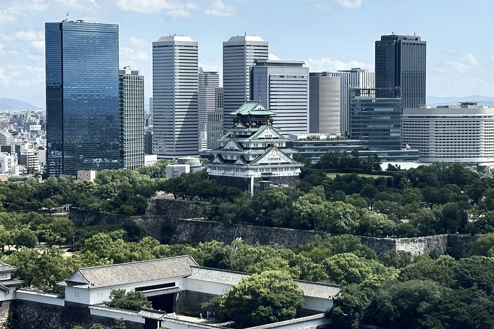 The castle framed by Osaka’s modern skyline.