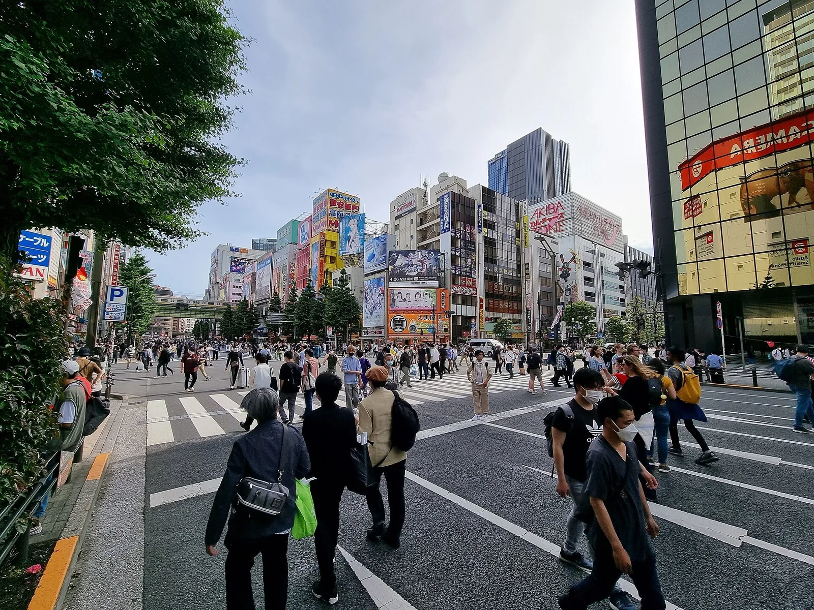 Pedestrians on the main street in Akihabara in May 2023.